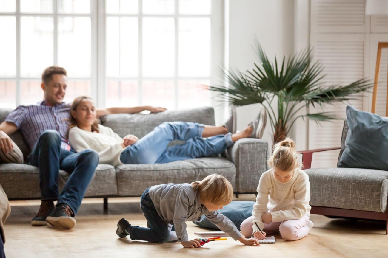 Happy family enjoying their clean home